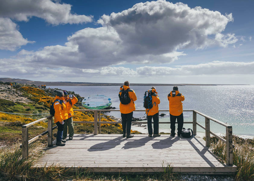 Passengers viewing the coast