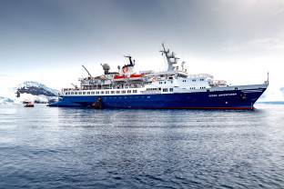 Guests board their zodiac boats from the starboard (right) side of the expedition ship Ocean Adventurer.