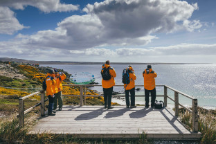 Passengers viewing the coast