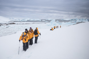 Passengers hiking through Antarctica