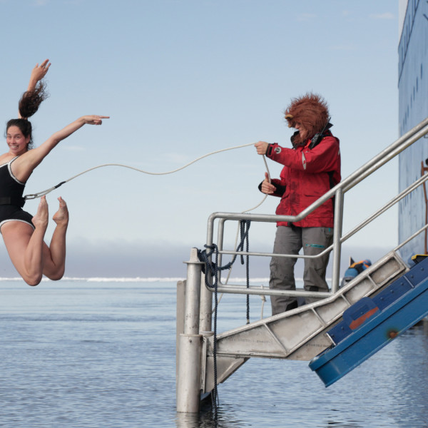 Passenger enjoying the Polar Plunge experience in Svalbard